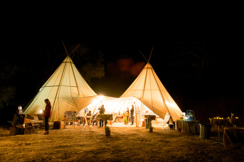 TipiMarqui™ Our 30 ft in diameter, large event tent, the TipiMarqui™ can be conjoined to create an even larger space suitable for dining, receptions or dancing. Our large tent rental is made entirely of canvas and handsome wood beams –you will not find any plastic on these fine tents.
Our marquee rentals have adjustable sides that can go up or down to fit the weather. In addition, the white canvas is a light and bright neutral backdrop, just waiting to be adorned in any style. Use lighting to create a glow from within or enjoy the sunlight that naturally lights this large event tent. As our most popular wedding tent rental, the TipiMarqui™ has been styled with rustic western, classic New England, black and white sleek modern, and vintage designs –to name a few. The possibilities for our marquee rentals are as limitless as your imagination!