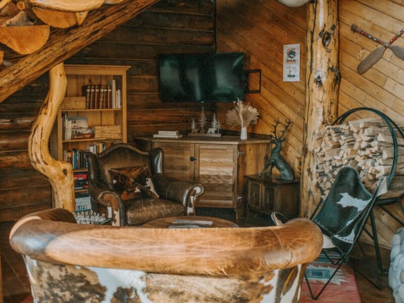 Bar and Ranch Main lodge game room and armchairs